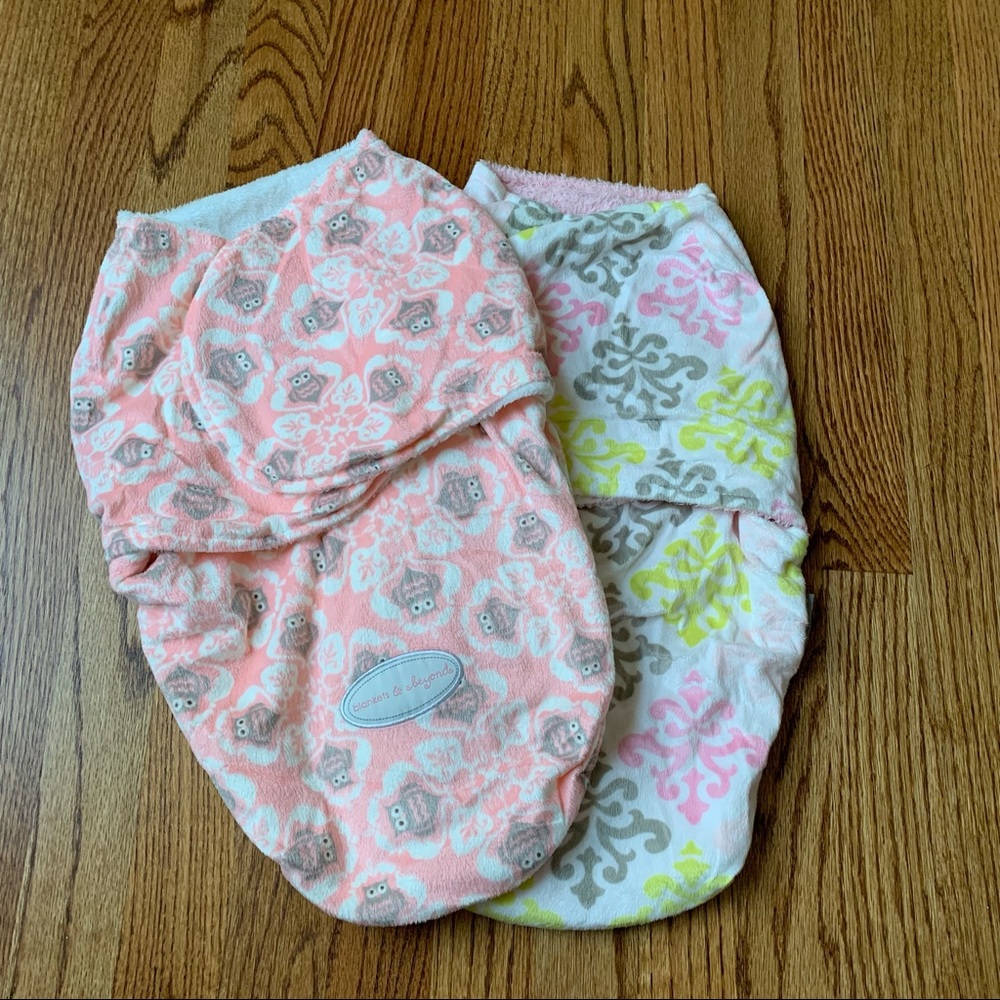 Two Pink yellow gray white sleep sack swaddlers
